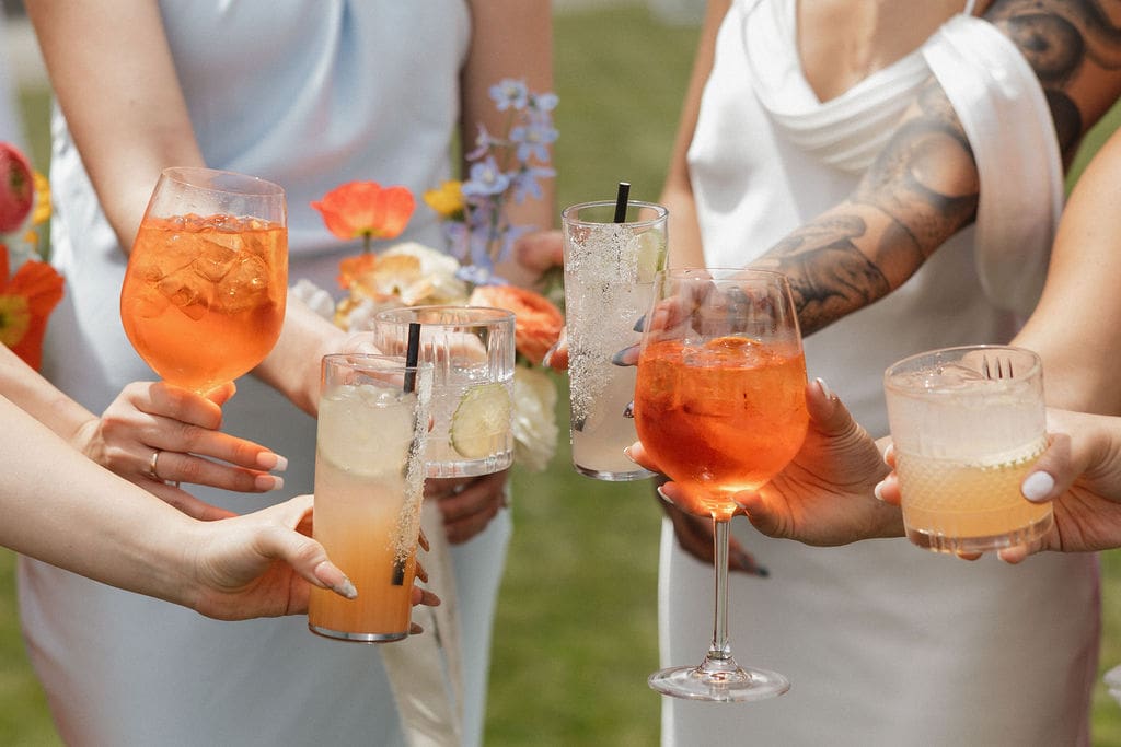 Modern cocktail with dried orange garnish for wedding reception