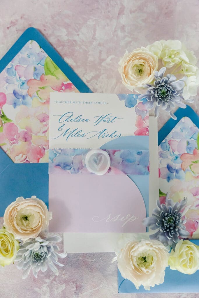 Romantic watercolor wedding invitation close up